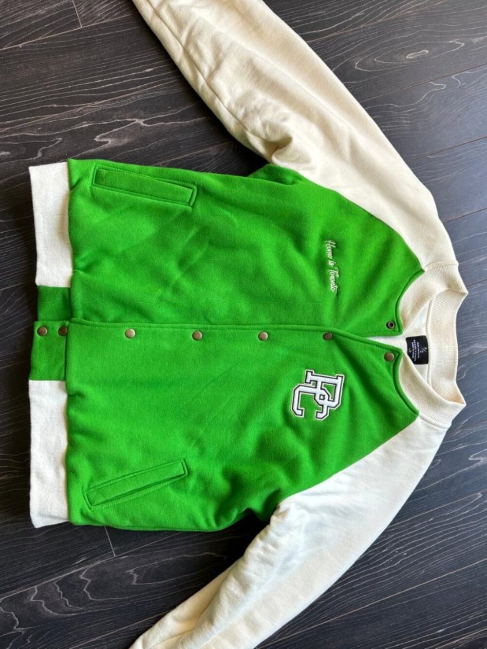 Peace Collective Home is Toronto green letterman jacket